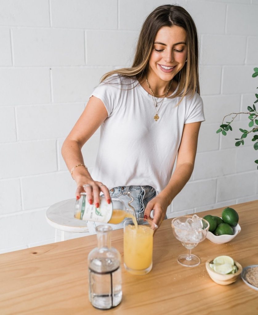 Women making margarita.